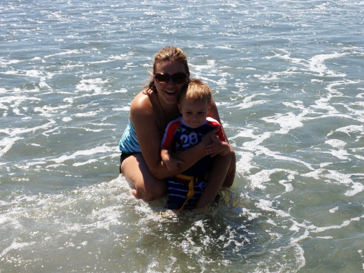 Enjoying the waves with mommy!